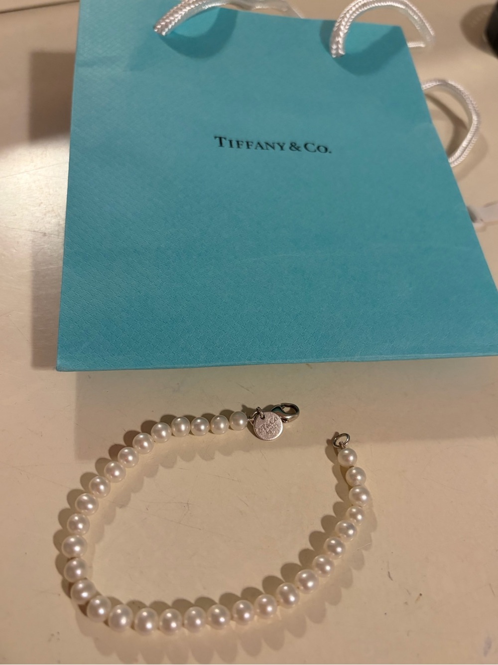 Tiffany & Co. Pearl Bracelet with Silver Charm